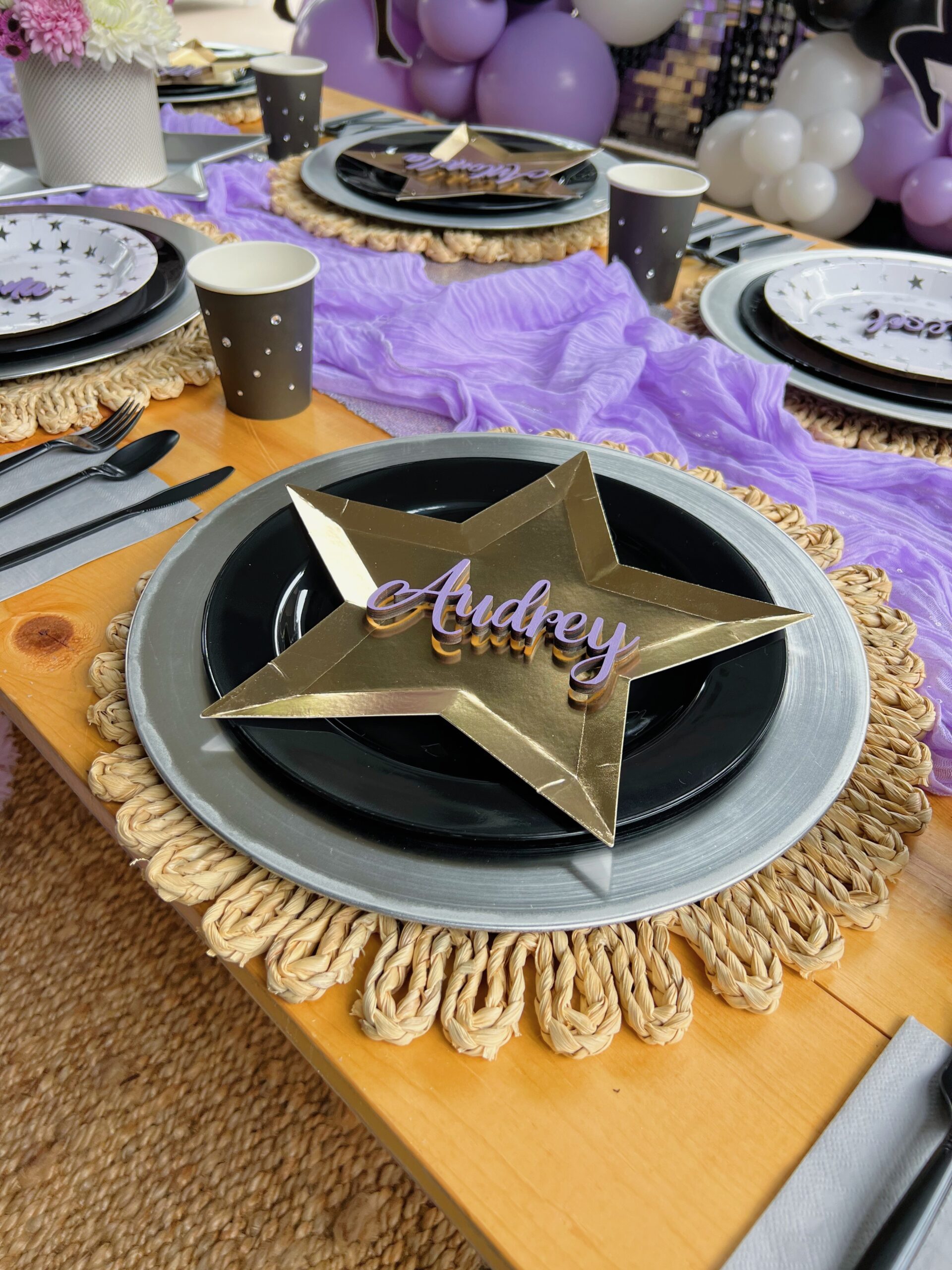gymnastics party ideas and decor backdrop and balloons end of the season party centerpiece and plates table decor diy